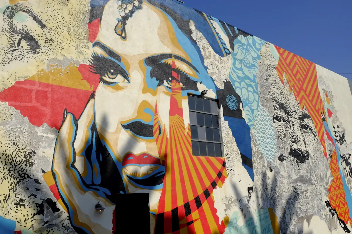 A colorful street mural painted on a city wall
