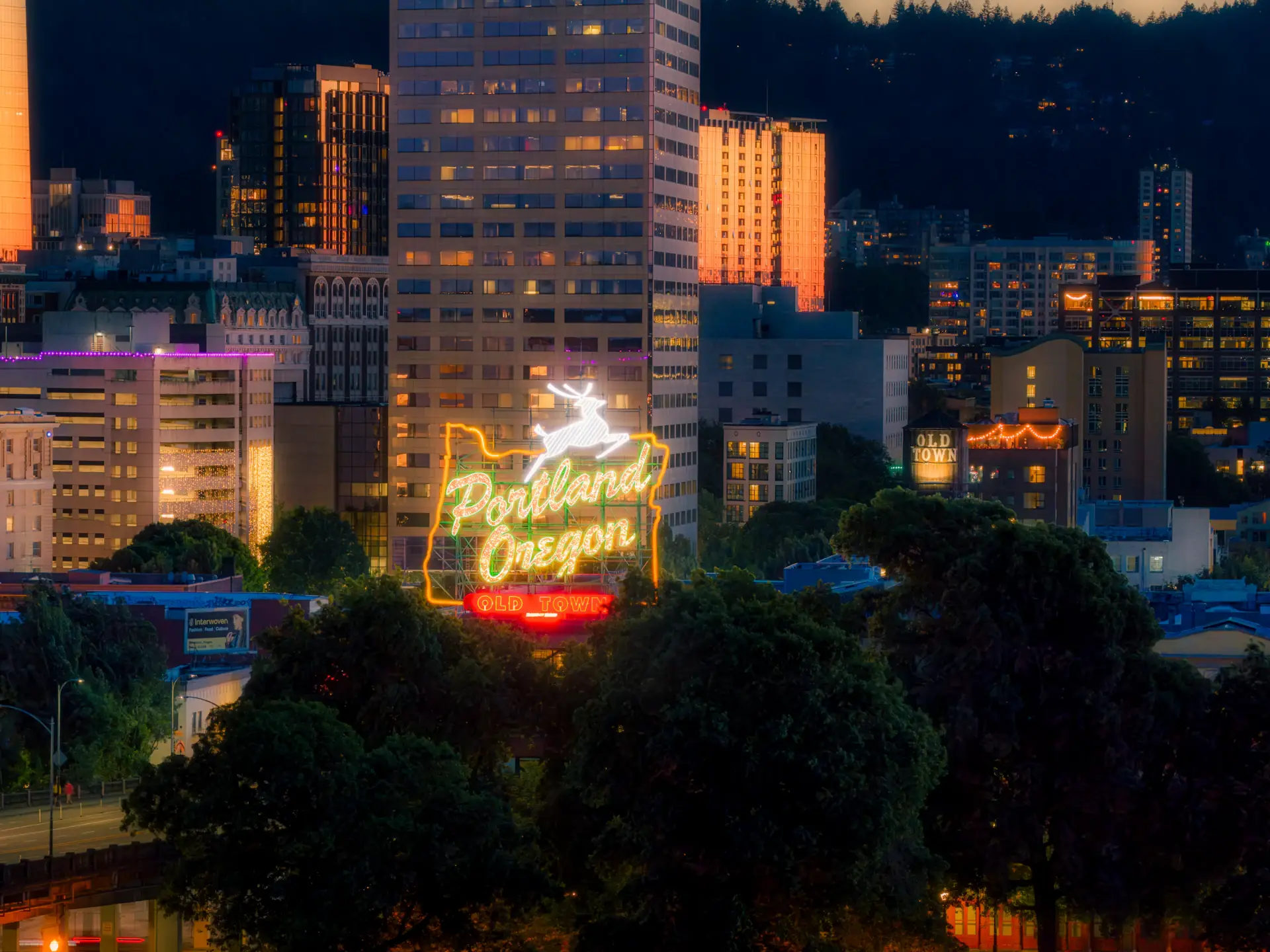 The illuminated Portland Oregon sign at dusk
